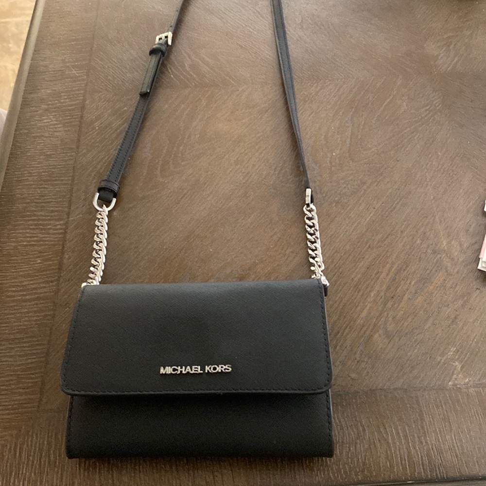 Michael Kors cross body purse.